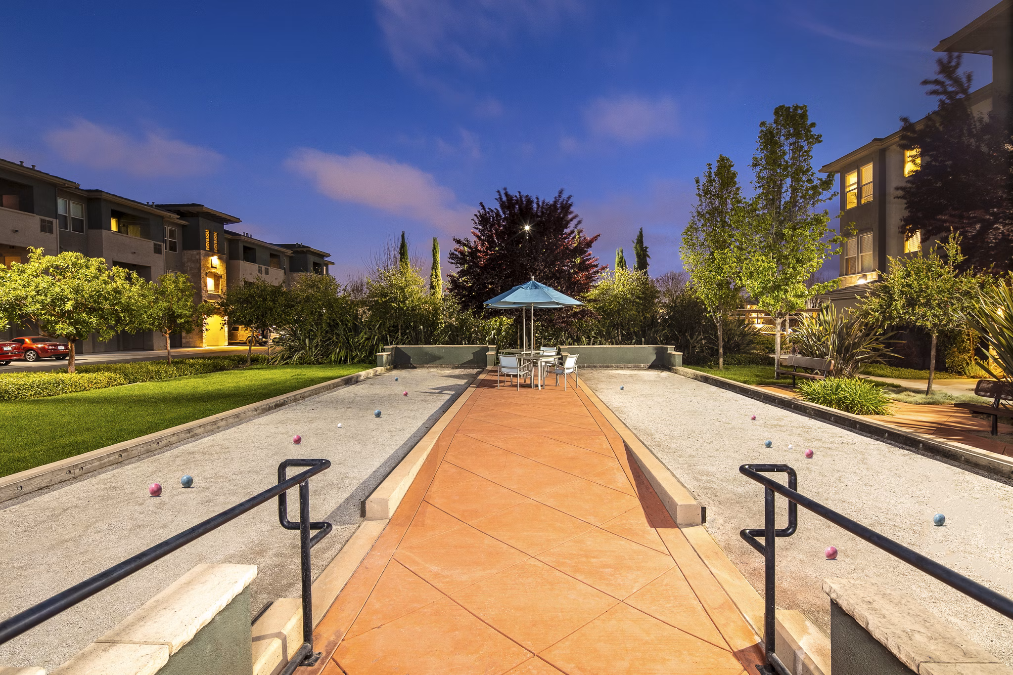 Fiori Estates Apartments: Tranquil courtyard with lush landscaping and seating areas, ideal for relaxation