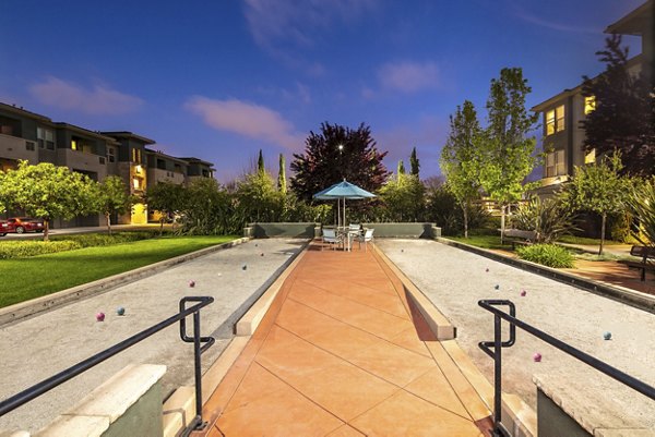 Fiori Estates Apartments: Tranquil courtyard with lush landscaping and seating areas, ideal for relaxation