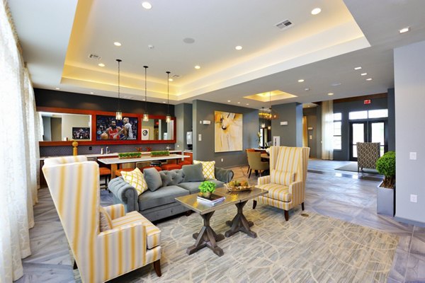 Elegant clubhouse at The Townhomes at Woodmill Creek featuring modern design and social gathering spaces