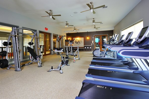 Fitness room at The Townhomes at Woodmill Creek