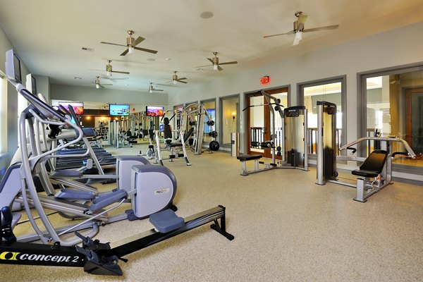Fitness room at The Townhomes at Woodmill Creek