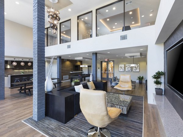 Spacious clubhouse with modern furnishings at 481 on Mathilda Apartments