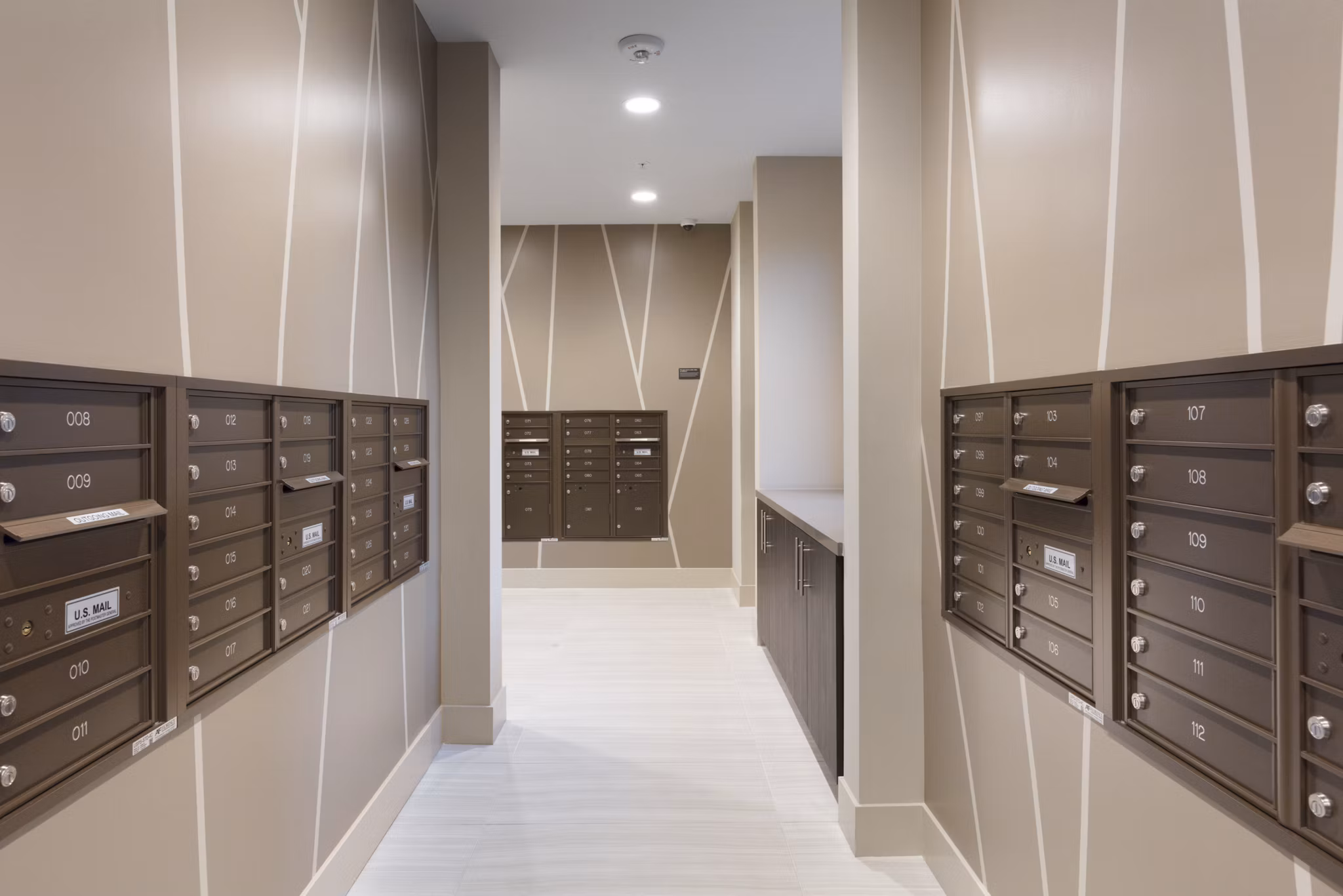 Modern mail room with parcel lockers at 481 on Mathilda Apartments