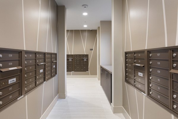 Modern mail room with parcel lockers at 481 on Mathilda Apartments