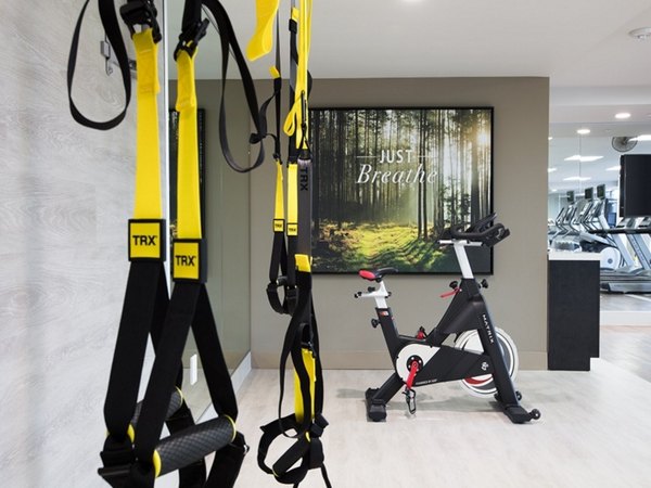 Modern fitness center with state-of-the-art equipment at 481 on Mathilda Apartments, perfect for an active lifestyle in luxury living