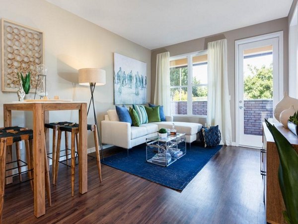 Living room with modern decor at 481 on Mathilda Apartments offering luxury living spaces in prime location