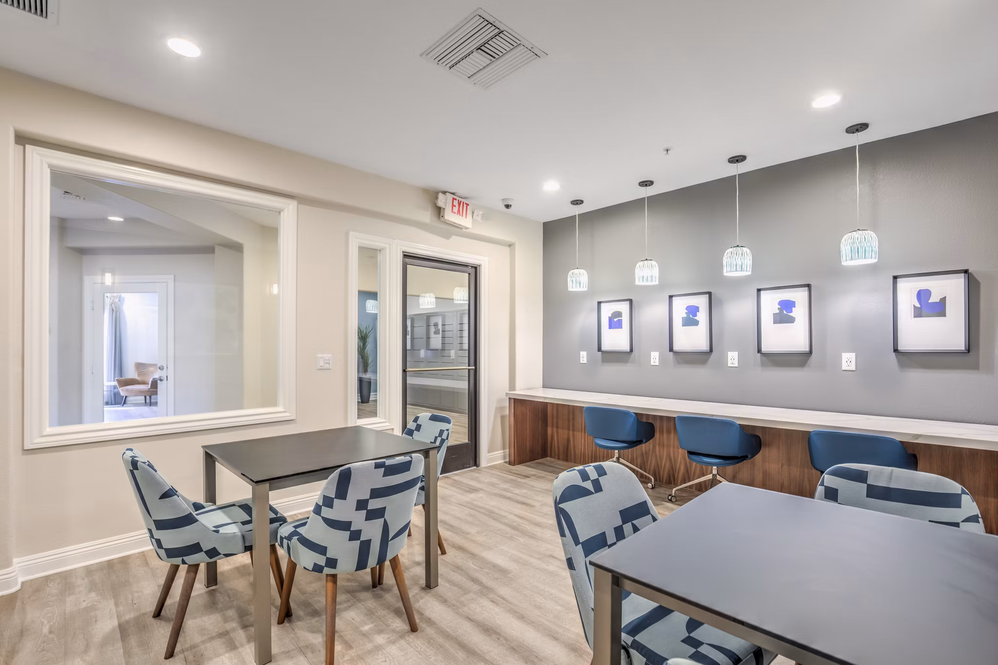 Clubhouse featuring modern furnishings and communal space at Stone Canyon Apartments