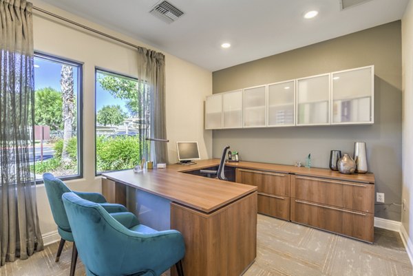 Clubhouse featuring modern design and cozy seating at Stone Canyon Apartments