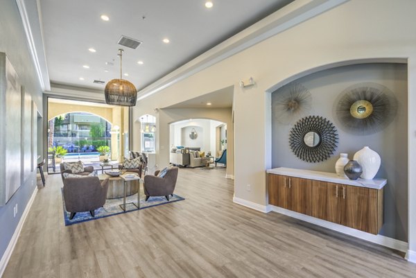 Clubhouse featuring modern decor and ample seating at Stone Canyon Apartments