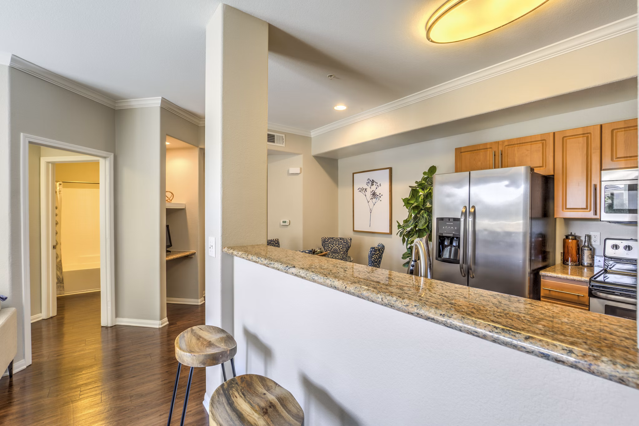 Modern kitchen featuring stainless steel appliances at Stone Canyon Apartments
