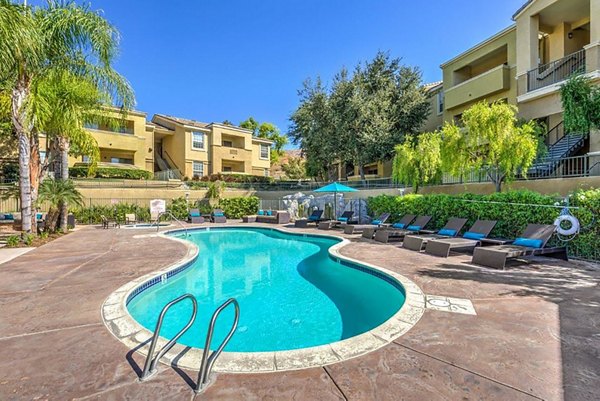 Luxurious pool at Stone Canyon Apartments offering resort-style relaxation in a serene setting