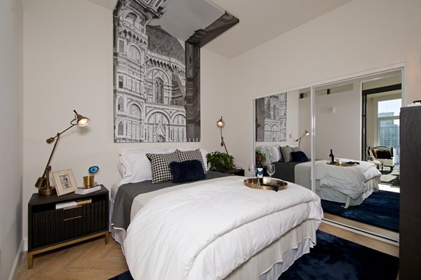 bedroom at Eighteen Ten State St. Apartments