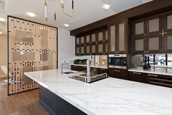 Eighteen Ten State St: Elegant clubhouse with modern furnishings and vibrant decor, enhancing luxury apartment living experience