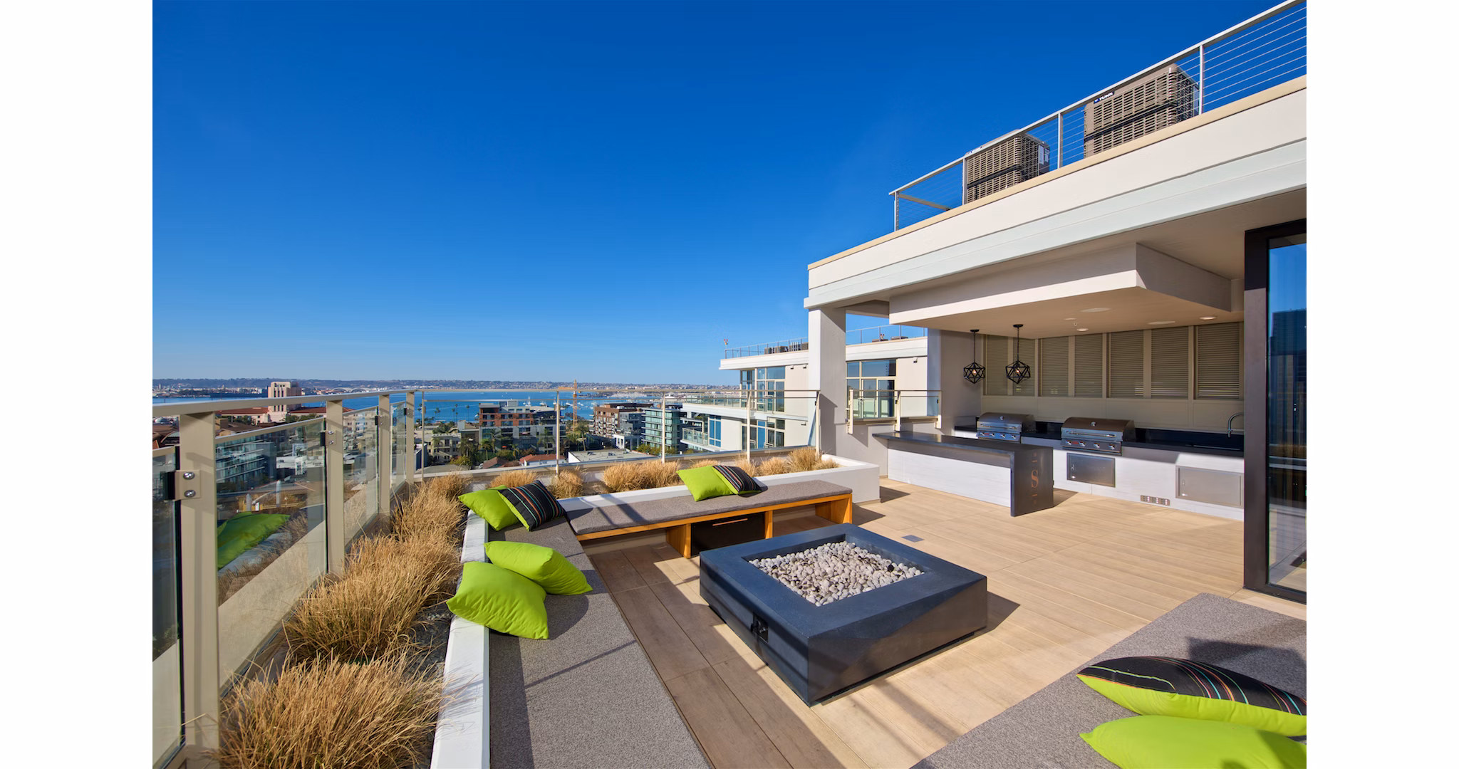 Cozy outdoor fire pit area at Eighteen Ten State St Apartments, ideal for gatherings and relaxation in a luxury apartment setting