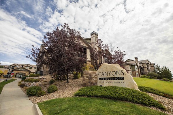 Canyons at Saddle Rock Apartments: Elegant building with prominent signage