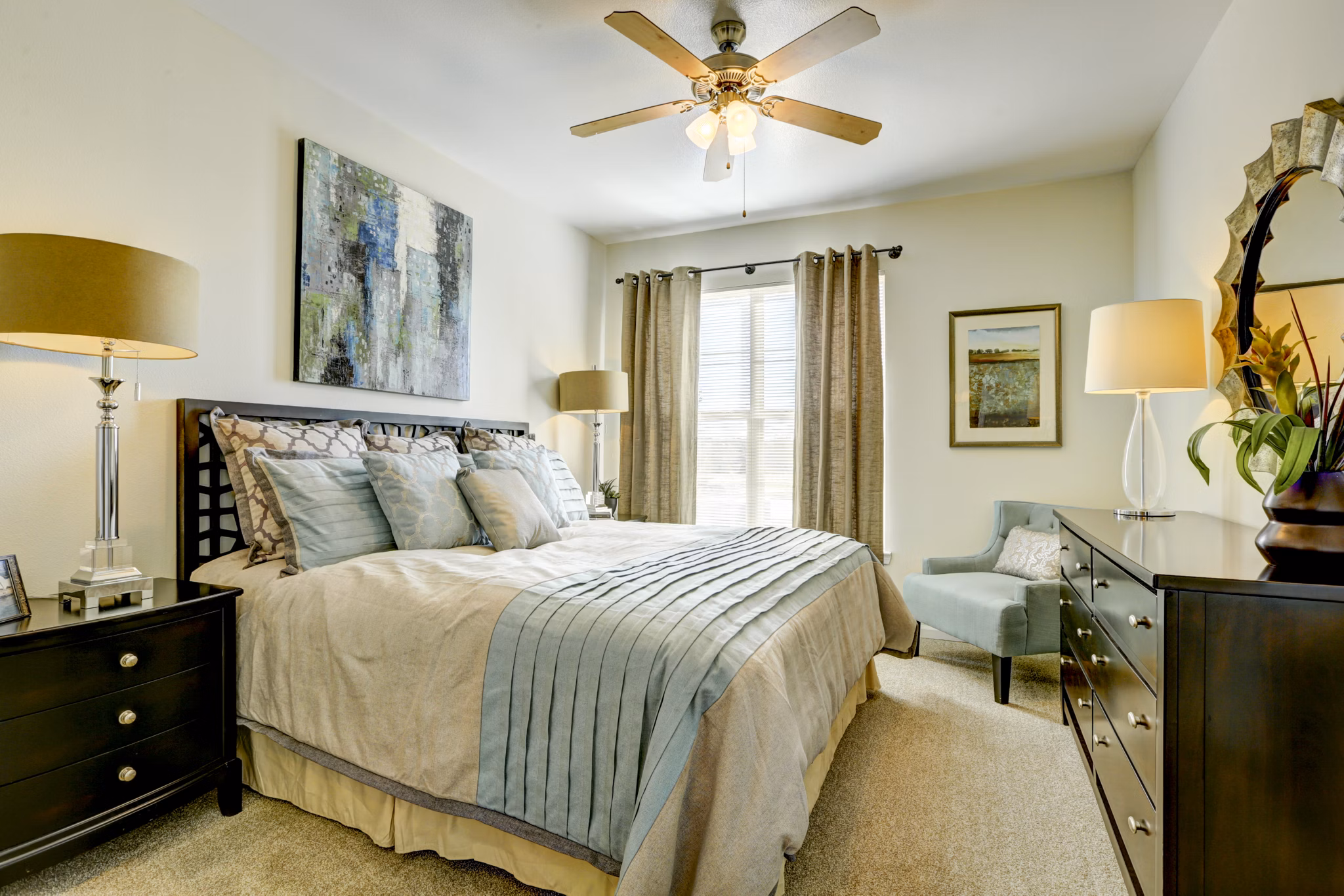 Cozy bedroom featuring elegant decor at Canyons at Saddle Rock Apartments