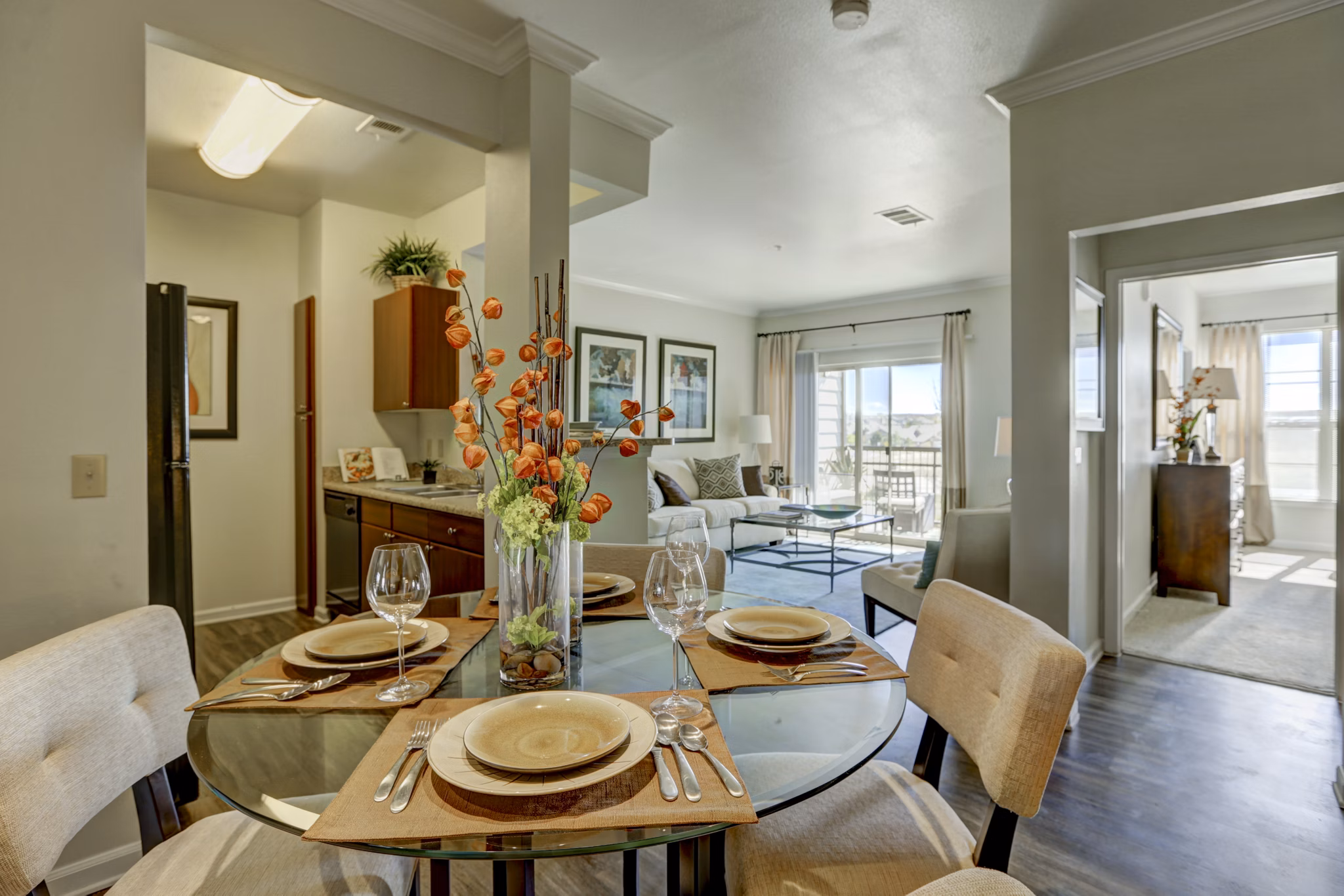 Dining area with modern decor at Canyons at Saddle Rock Apartments, featuring elegant furnishings and ample natural light
