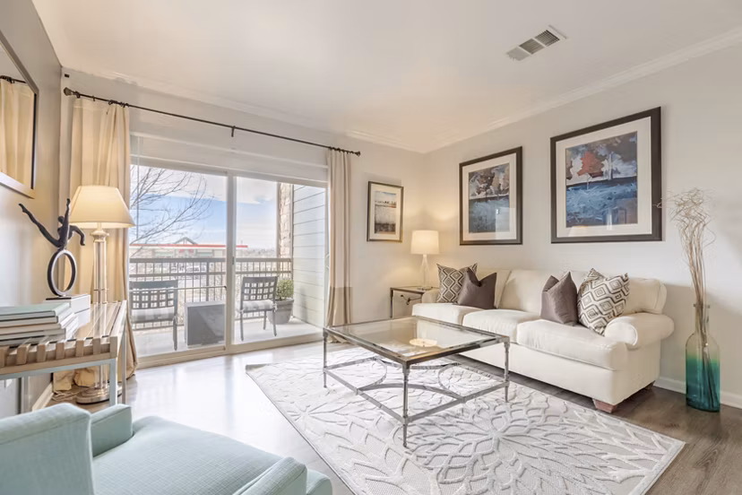 Spacious living room with modern decor in Canyons at Saddle Rock Apartments