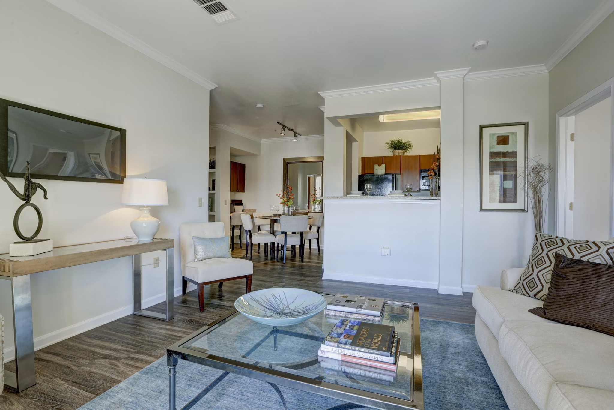 Spacious living room with modern decor in Canyons at Saddle Rock Apartments