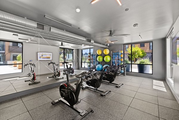 fitness center at Sevens Apartments
