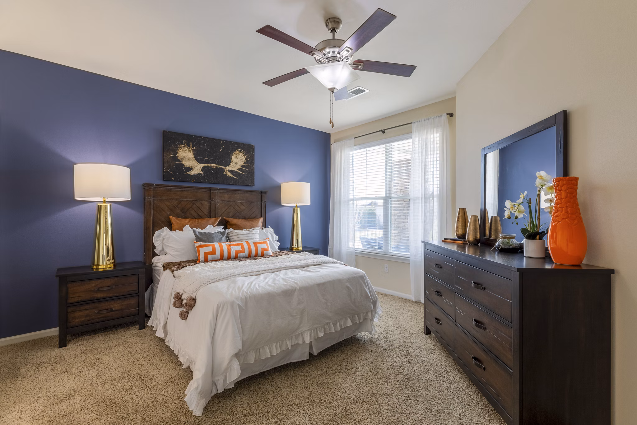 Stylish bedroom with contemporary decor at Waterford at Southlands Apartments, a luxury Greystar community