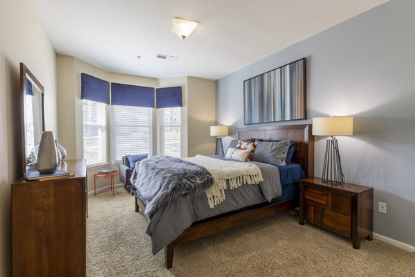 Cozy bedroom with natural light at Waterford at Southlands Apartments