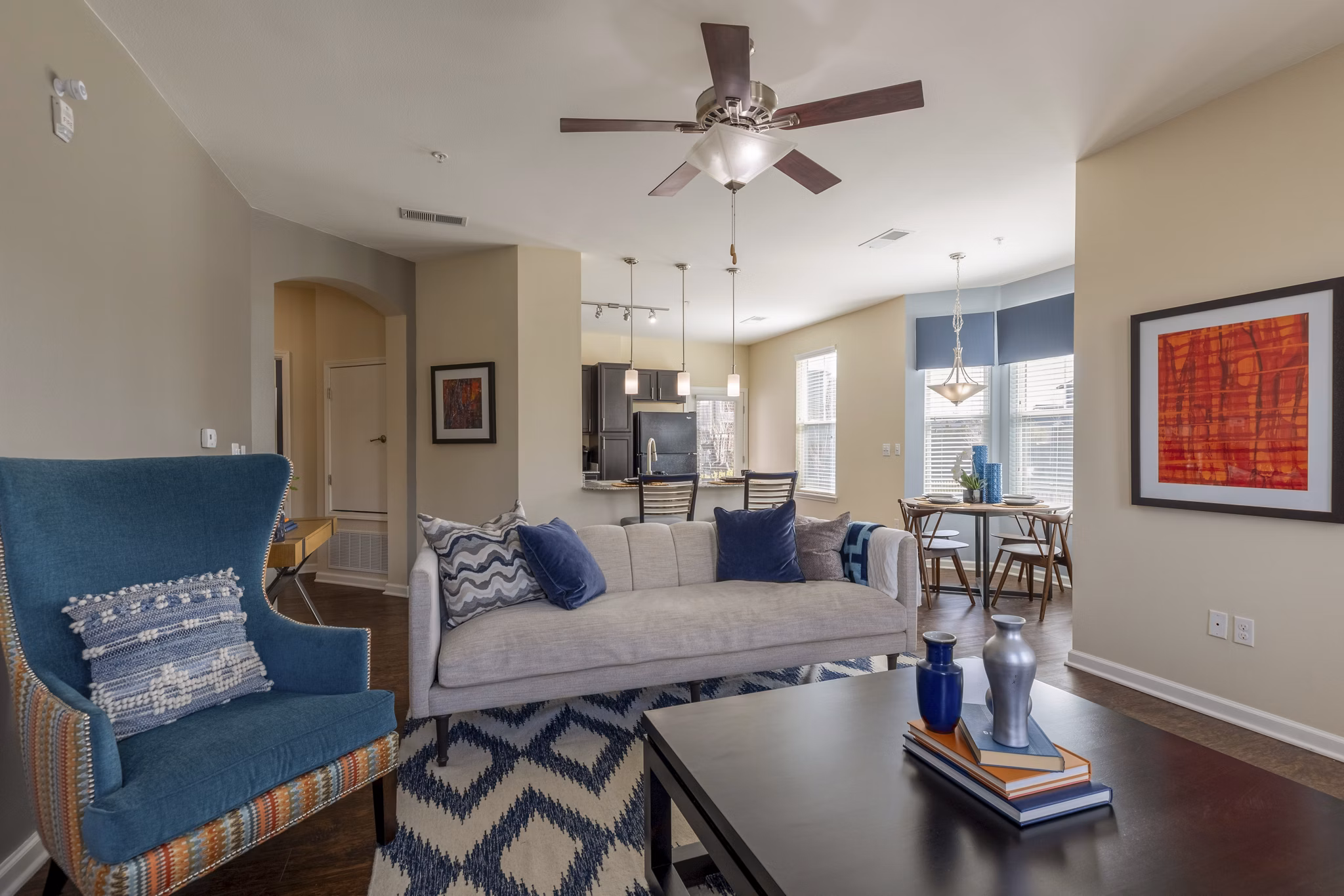 Spacious living room with modern decor at Waterford at Southlands Apartments in Aurora, CO offering luxury living