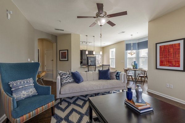 Spacious living room with modern decor at Waterford at Southlands Apartments in Aurora, CO offering luxury living