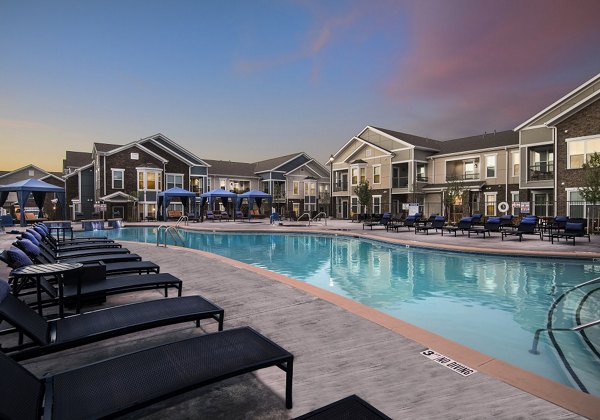 Sparkling outdoor pool at Waterford at Southlands Apartments offering luxury relaxation and recreation amenities