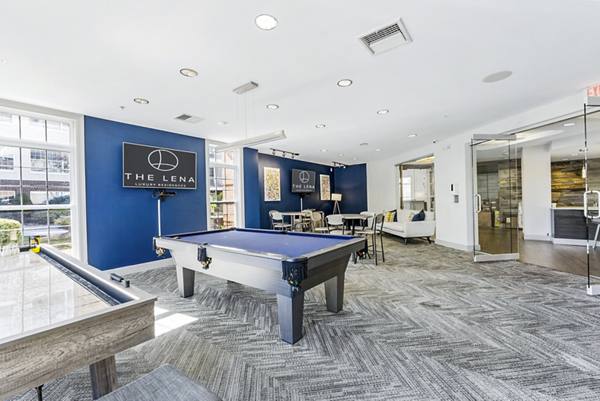 clubhouse game room at The Lena Apartments