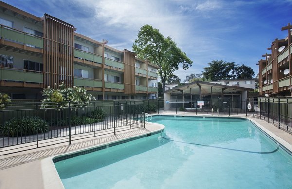 Luxurious outdoor pool at Woodland Park Apartments, perfect for relaxation and recreation