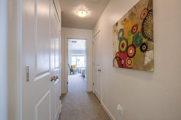Modern hallway with sleek lighting fixtures at Rockwell Village Apartments