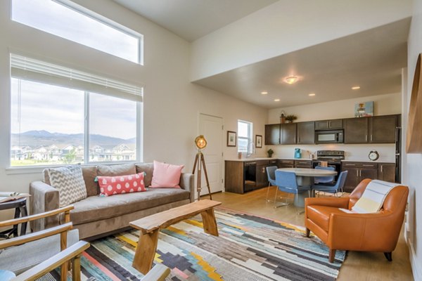 Modern living room with sleek furniture at Rockwell Village Apartments in a luxury setting