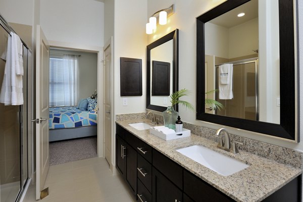 Luxurious bathroom with marble accents at Broadstone Woodmill Creek Apartments