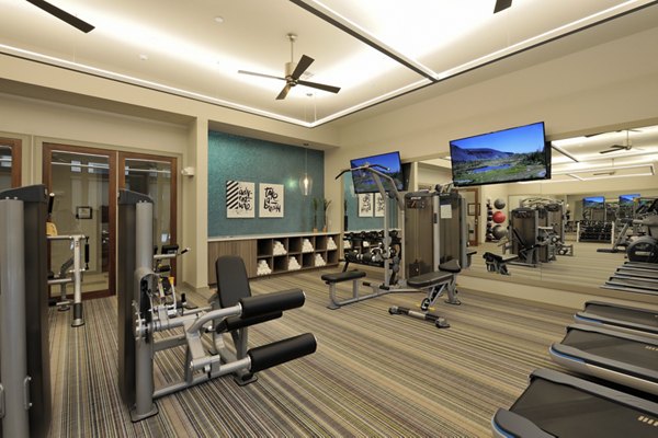 State-of-the-art fitness center featuring modern equipment at Broadstone Woodmill Creek Apartments