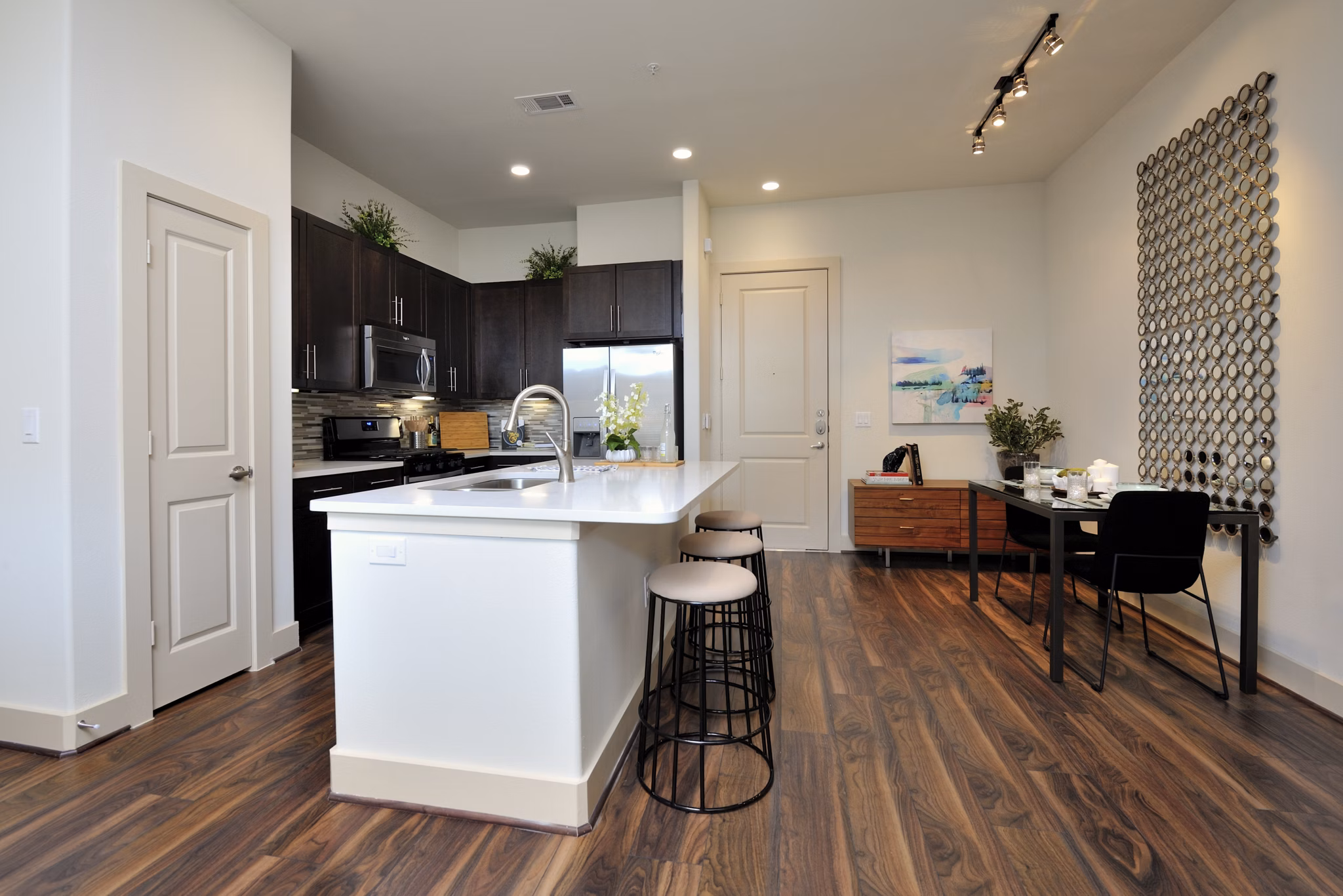 Modern kitchen with stainless steel appliances at Broadstone Woodmill Creek Apartments