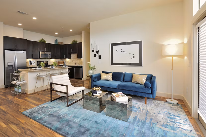 Spacious living room with modern decor at Broadstone Woodmill Creek Apartments