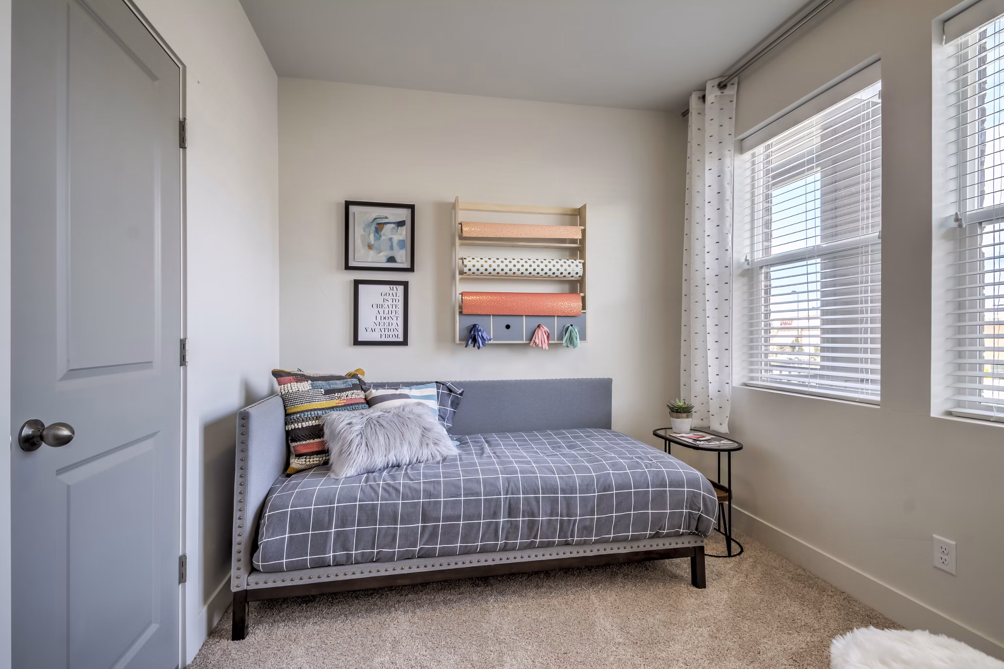 Cozy bedroom with modern decor at Avanti at Farmington Station Apartments
