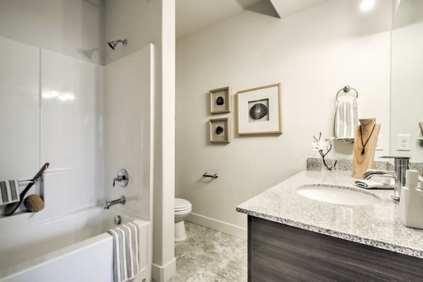 Bathroom featuring modern fixtures at Avanti at Farmington Station Apartments