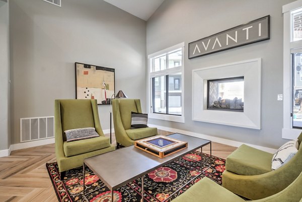 Elegant clubhouse with modern seating and entertainment options at Avanti at Farmington Station Apartments