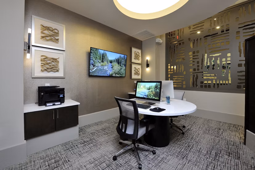 Business center with modern workstations at Broadstone Energy Park Apartments