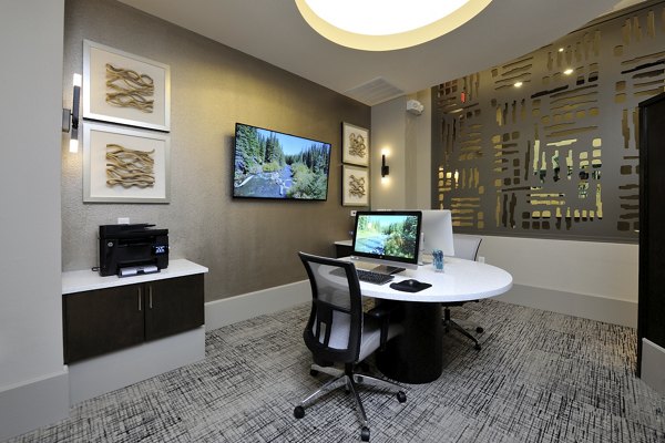 Business center with modern workstations at Broadstone Energy Park Apartments
