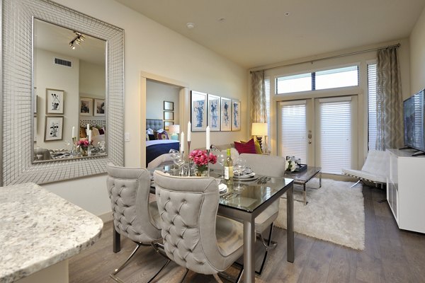 Dining area featuring modern decor and ample seating at Broadstone Energy Park Apartments