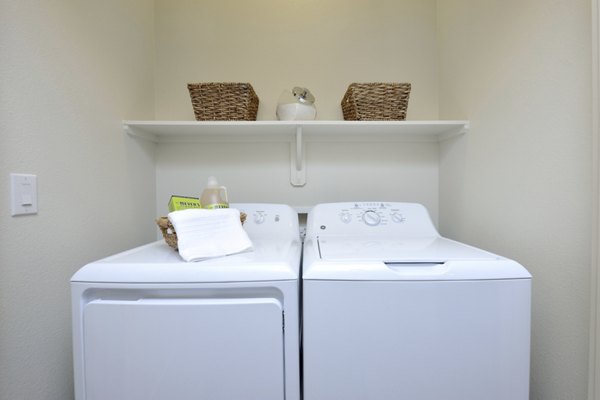 Modern laundry room with energy-efficient appliances at Broadstone Energy Park Apartments