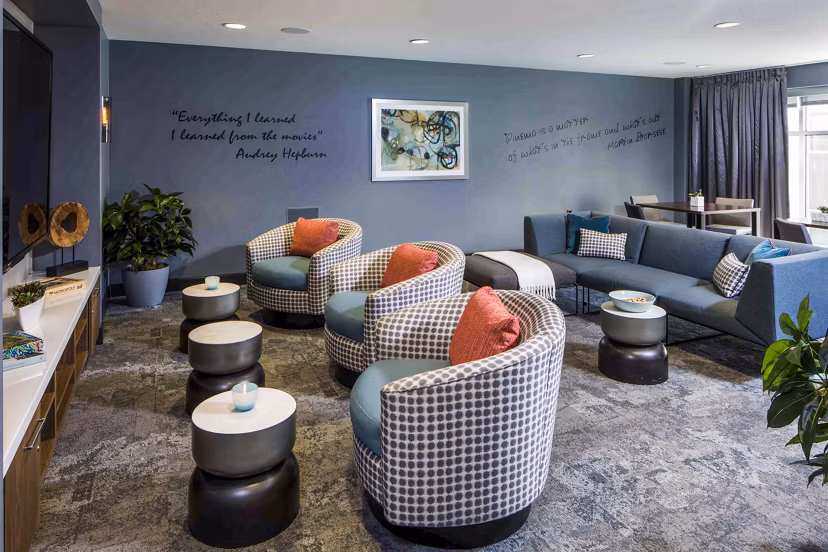 Modern clubhouse with sleek decor and seating at Jefferson Platinum Triangle Apartments, perfect for luxury living and community events