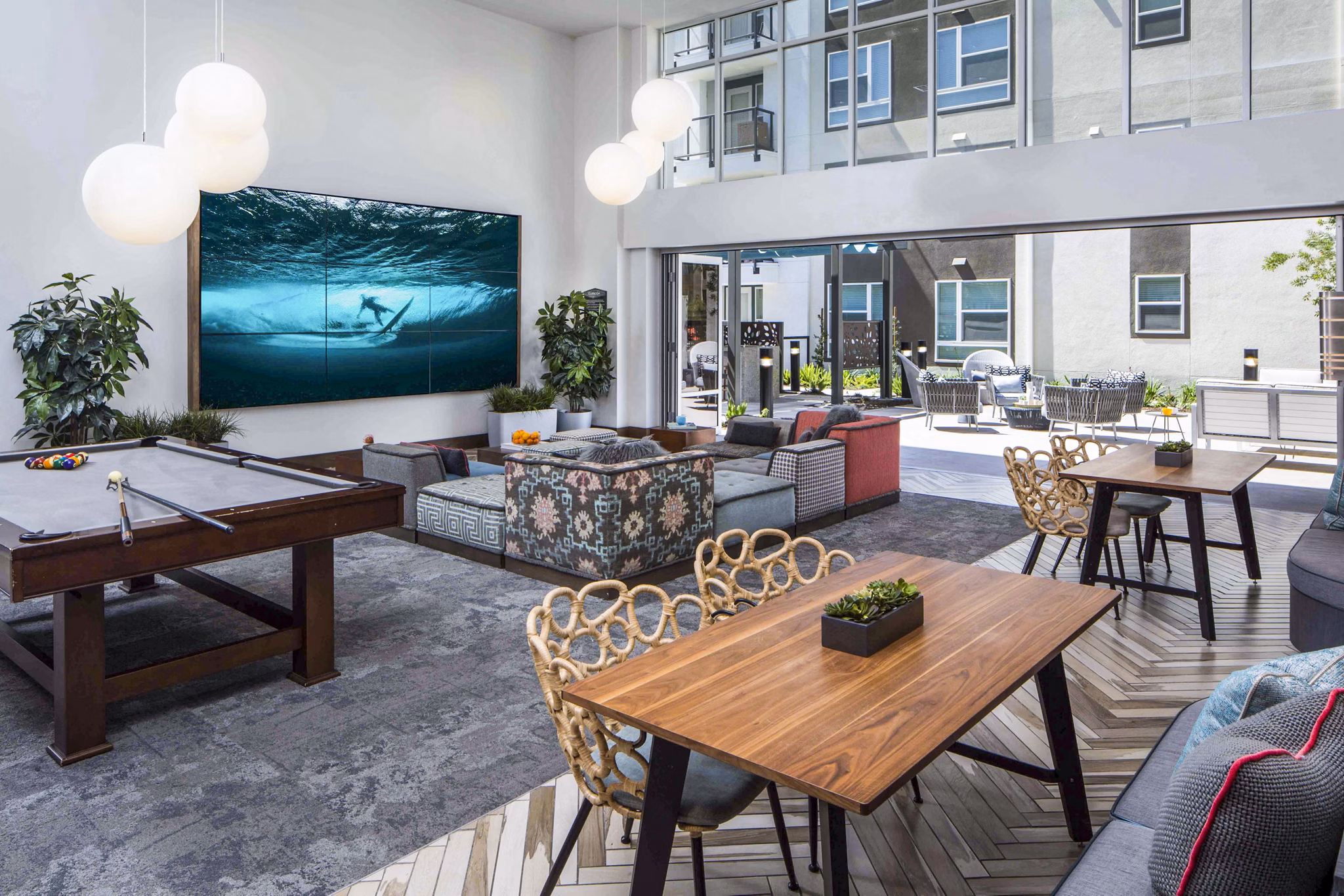 Elegant clubhouse lobby with modern decor at Jefferson Platinum Triangle Apartments