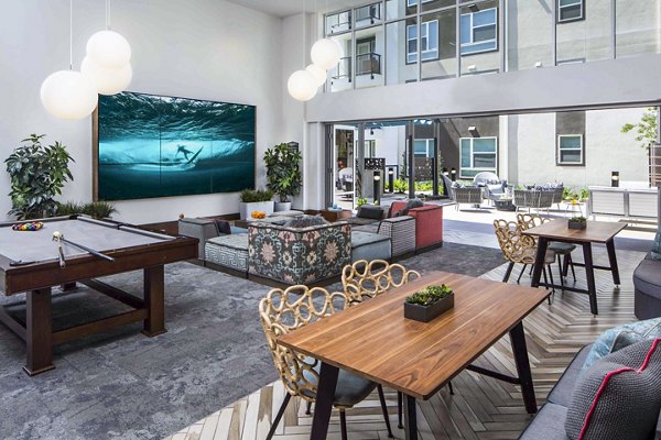 Elegant clubhouse lobby with modern decor at Jefferson Platinum Triangle Apartments