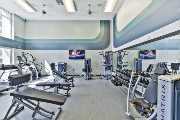 State-of-the-art fitness center with modern equipment at Jefferson Platinum Triangle Apartments