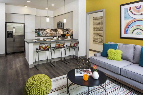 Spacious living room with modern decor at Jefferson Platinum Triangle Apartments, Anaheim Luxury style and comfort for an elevated lifestyle