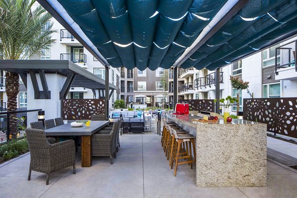 Modern grill area with stylish seating at Jefferson Platinum Triangle Apartments